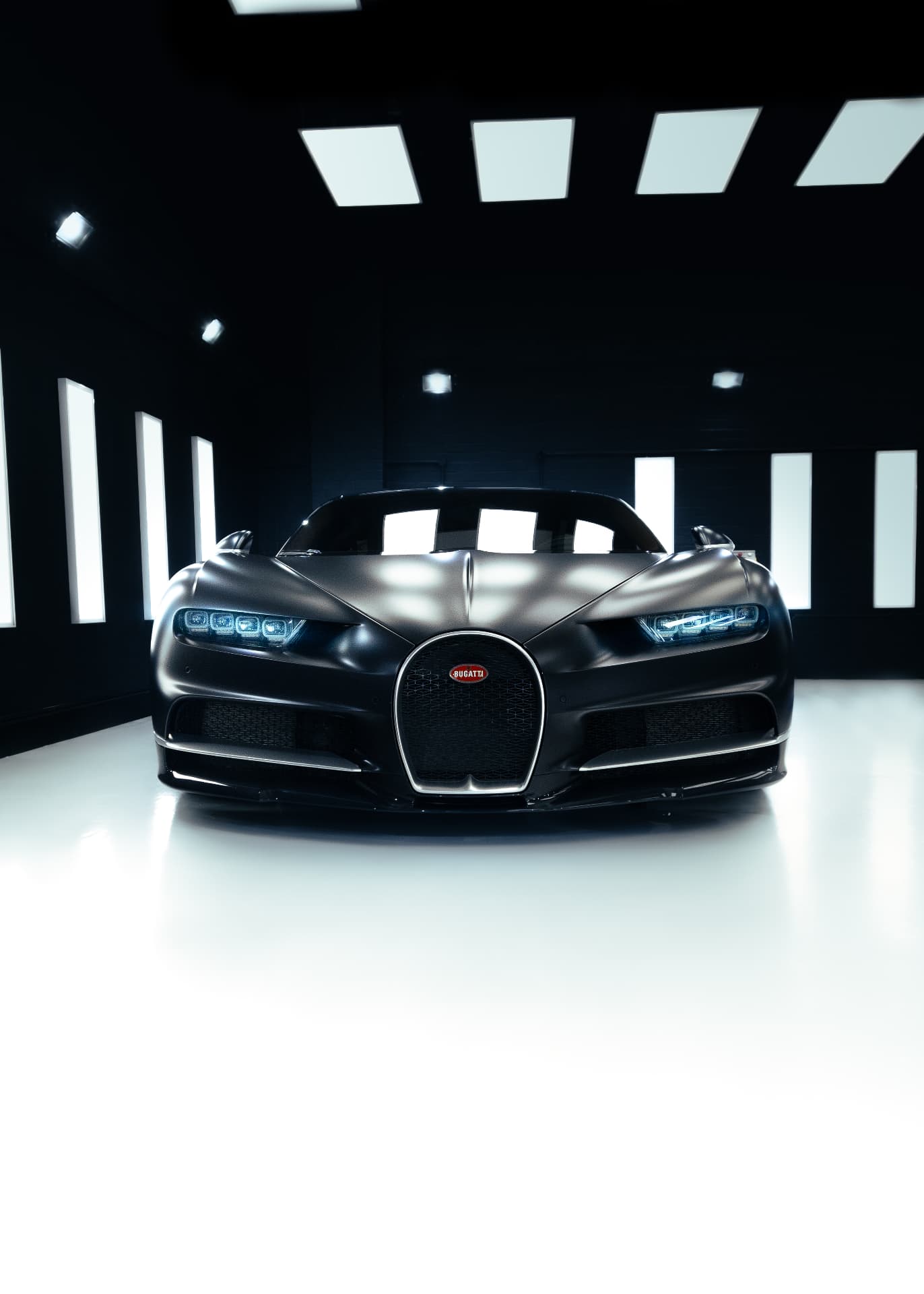 Matte black Bugatti Chiron lit in a studio for an automotive campaign